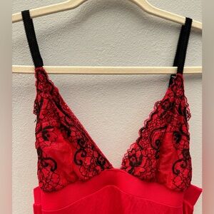 Red backless slip with black flower detailing